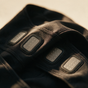 Close detail of the four flat electrode panels inside the fabric