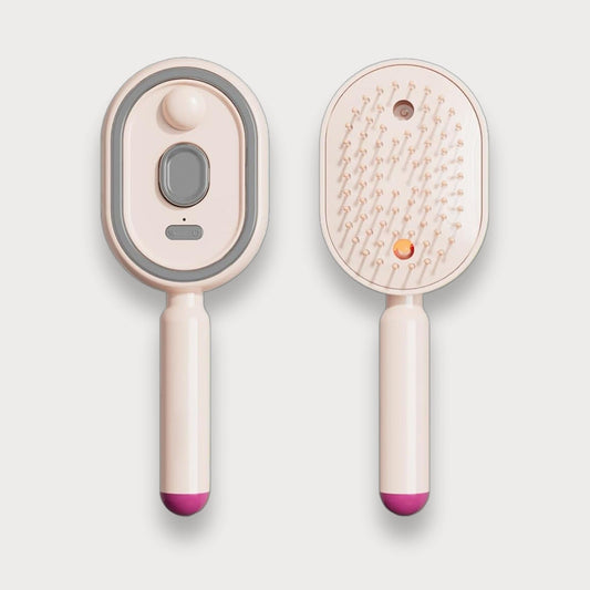 massage spray comb pink